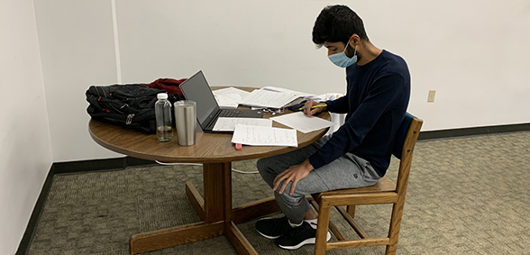 Masked Student Studying