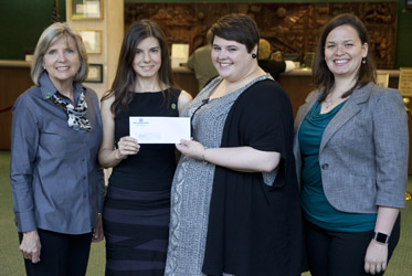 First Guaranty Bank donates to Community Music School