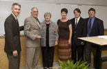 Dr. Patrick Settoon, Alumnus of Year, with family and Provost John Crain