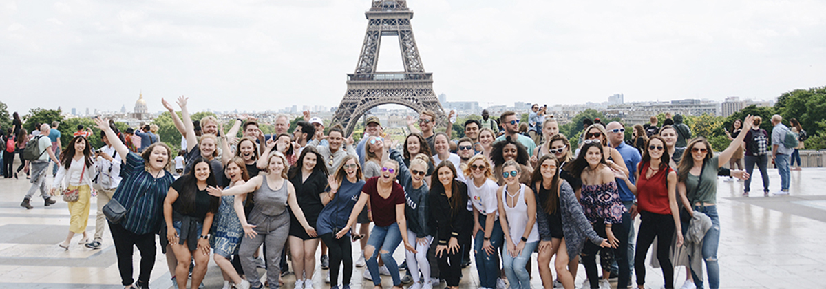 Study Abroad Group in Front of Eiffel Tower