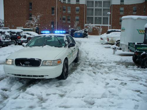 Snow on police car