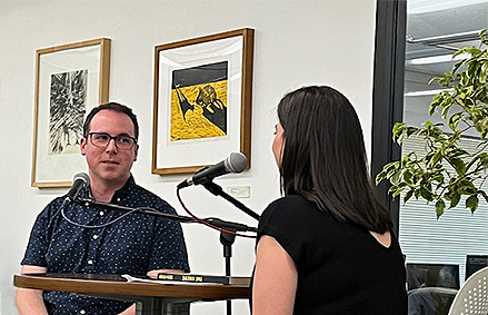 Author Seth Pevey being interviewed at the Annual Membership Tea given by the Friends