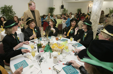 President Moffett and secretaries at Champagne bingo