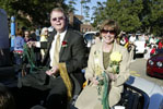 President Randy and Dr. Barbara Moffett toss treats at parade