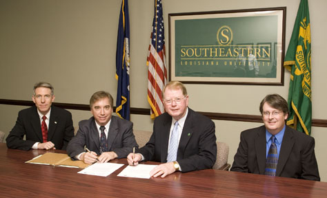 John Crain, Robert LoBue, President Randy Moffett, and Randy Settoon. 