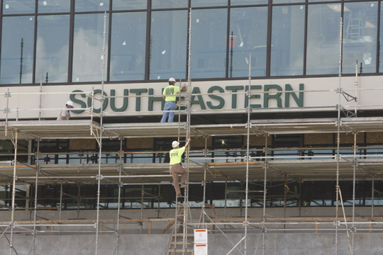 Workers attach "Southeaster" to West Stadium