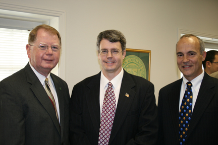 President Randy Moffett, Michael Ricks, and Bill Joubert, Small Business Development Center director