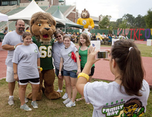 Southeastern mascot, Roomie, posed with families for photos at Family Day.