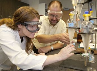 Caitlyn Guice and Phillip Voegel study clams in the lab