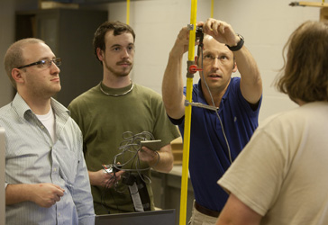 Rhett Allain in physics lab with students
