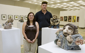 Dennis Sipiorski, head of the Department of Visual Arts, and Jamie Alonzo at her art showing