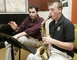 Ryan Miller, Salmen High School Senior, in one-on-one lesson with music instructor Richard Schwartz