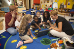 Susannah Ford, right, teacher at the Louisiana School of the deaf, works with her young students using the LAMBERT system developed by Southeastern education researchers.