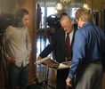 Southeastern Louisiana University Ford Chair of Regional Studies Samuel Hyde, right, reviews materials with Dr. Donald Pavy prior to their interview in the Louisiana State Capitol on the assassination of Governor Huey P. Long. Looking on is videographer/editor Josh Kapusinski of the Southeastern Channel.