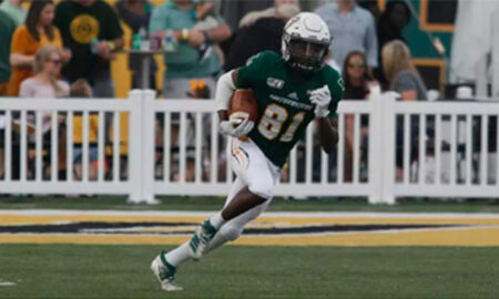 Southeastern Football player running with the football