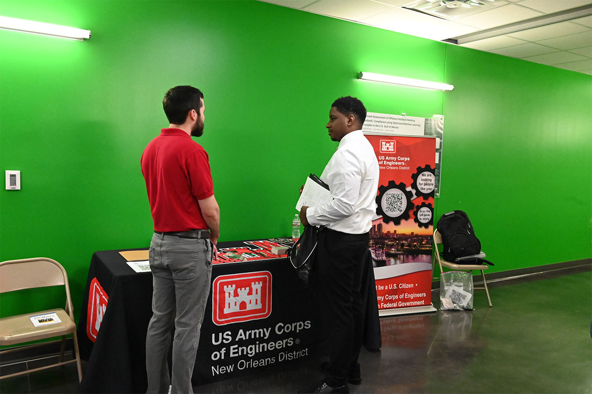 Student speaking with a professional in the field at Southeastern.