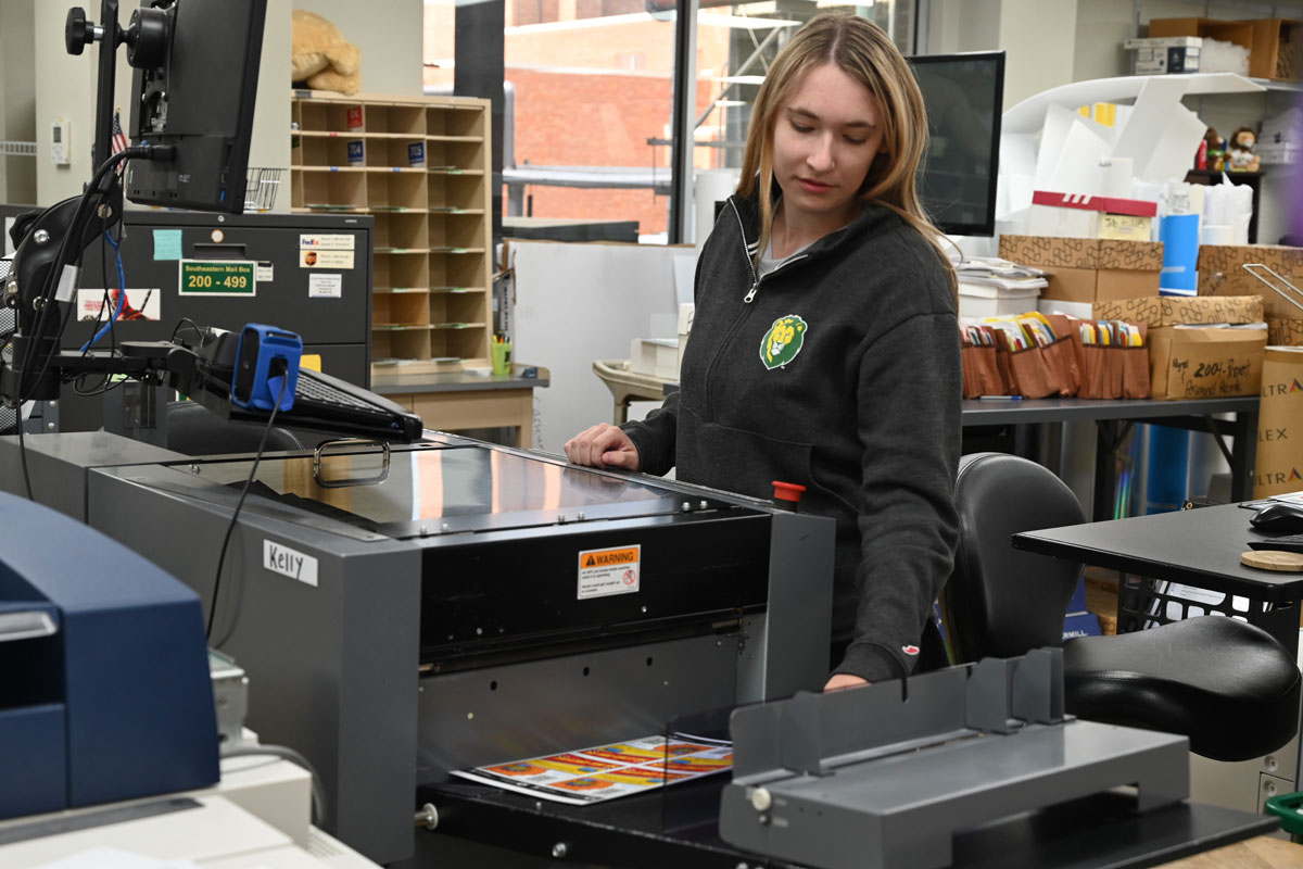 Student assistant making copies for her job at Docusource at Southeastern.