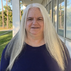 Headshot of Ms. Lisa Magee, Administrative Assistant for Marketing and Supply Chain Management.