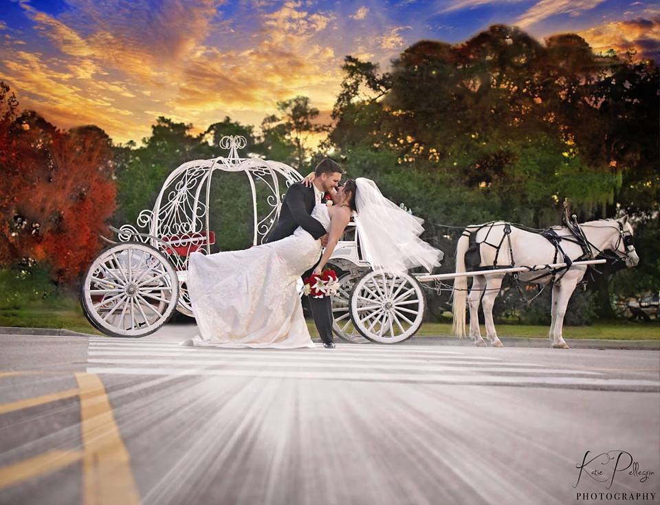 Megan and Hayes in front of a carriage.