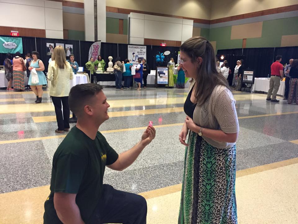 Hayes proposing to Megan in the Student Union ballroom.