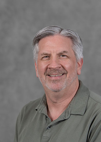 Headshot of Alan Cannon.