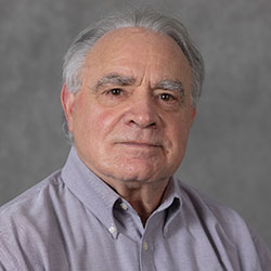 Headshot of George Gibson.