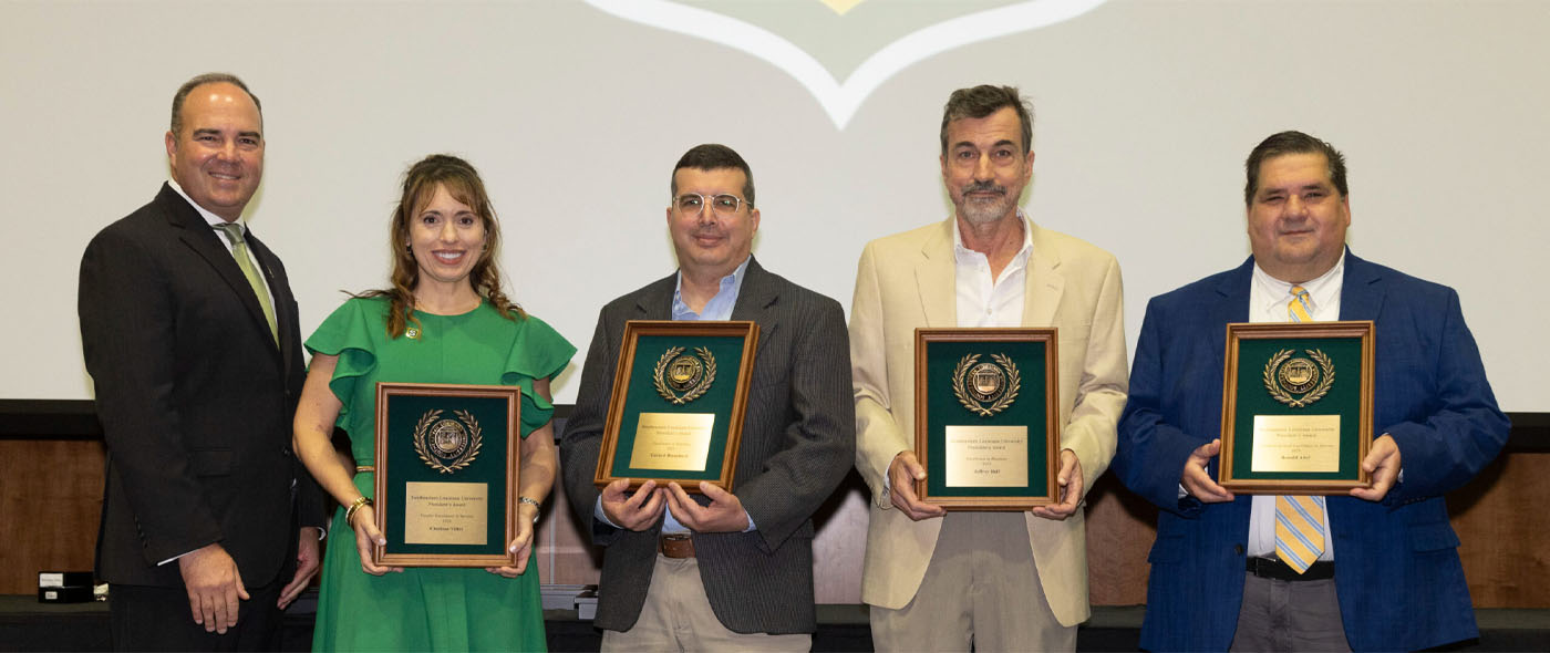 President Wainwright with the President's Awards for Excellence winners.