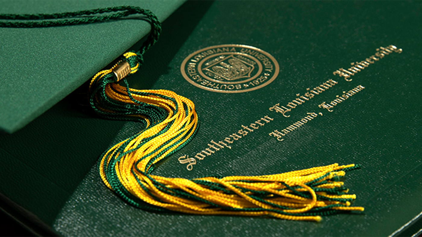 Graduation diploma cover and tassel