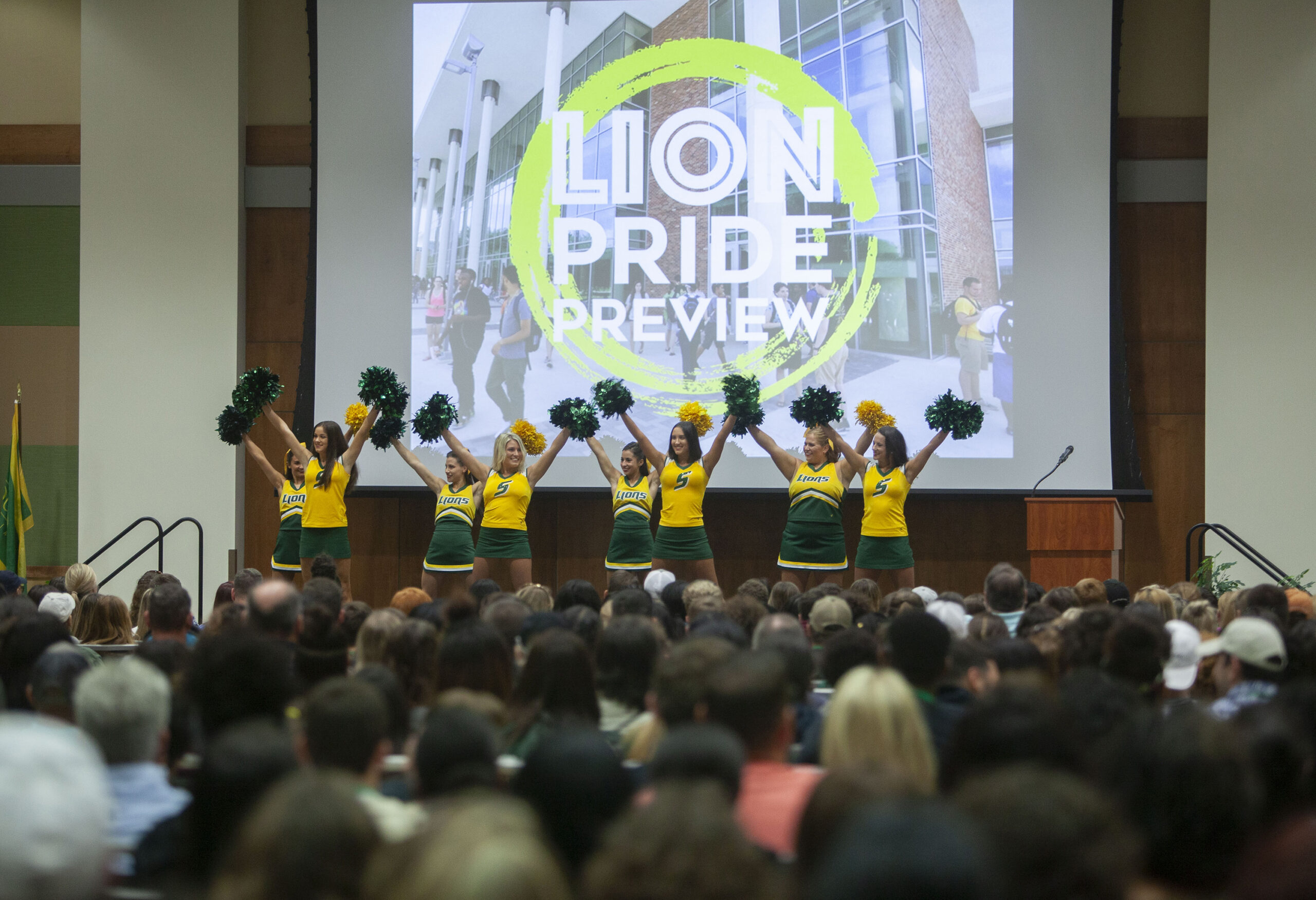 lion pride stage with cheerleaders