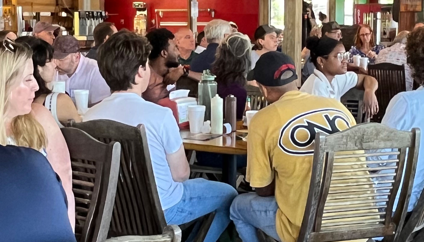 groups at tables at lunch and learn