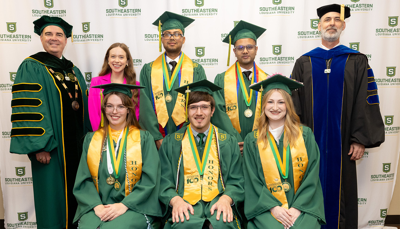 PRESIDENT’S MEDAL WINNERS, AFTERNOON CEREMONY, COLLEGE OF SCIENCE AND TECHNOLOGY – Medal winners included, sitting, from left, Savannah Cousins of Madisonville; Jared Talbot of Walker, and Carlie Bankston of Denham Springs. Standing, from left, are Southeastern President William S. Wainwright, commencement speaker and astronaut Haley Arceneaux, Subin Bista of Nepal, Niraj Bhatta of Nepal, and Vice President for Academic Affairs Eric Skipper. Not pictured is Ajyol Dhamala of Hammond.