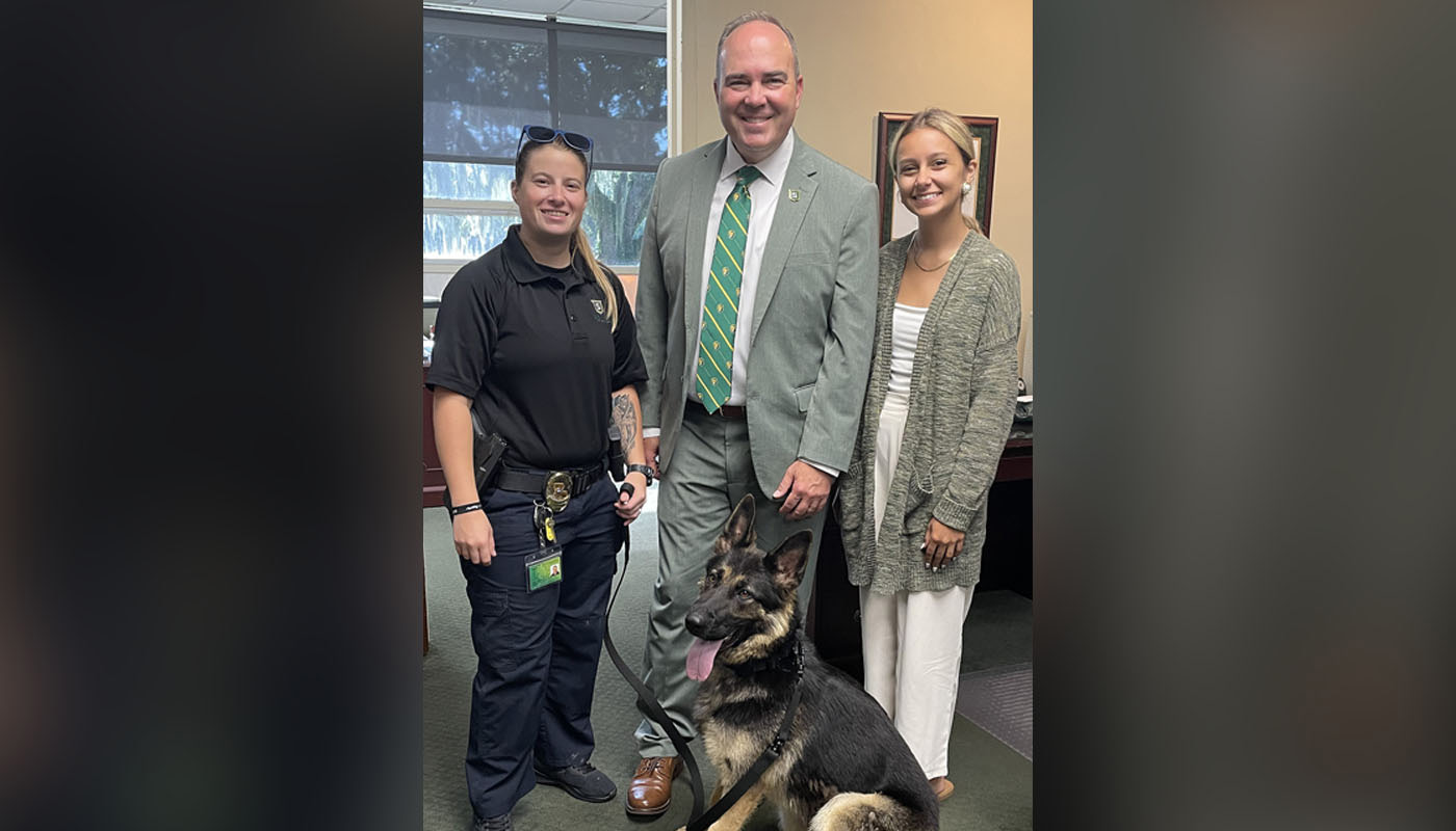 UPD with President Wainwright and new police dog.