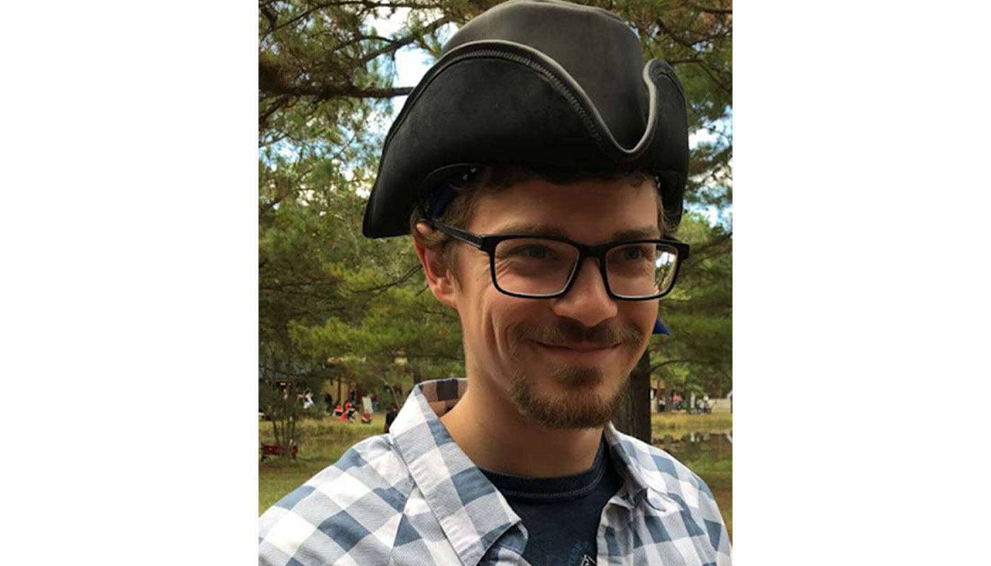 seth champagne wearing a pirate hat and glasses