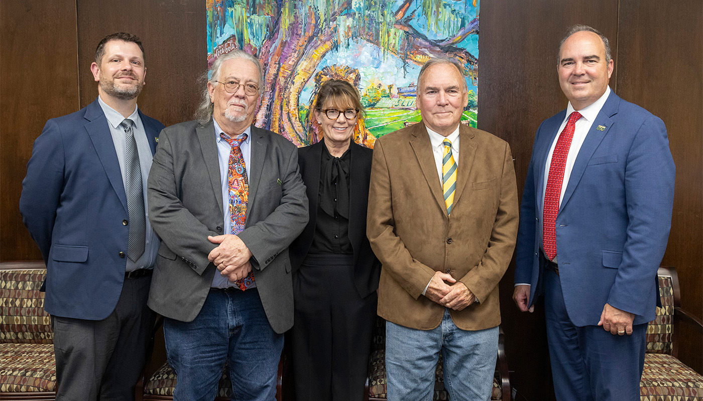 Pictured, from left, are Southeastern College of Arts, Humanities and Social Sciences Dean Jeff Wright, History and Political Science Department Head Bill Robison, Associate Professor of Military History Samantha Cavell, Freyder, and Southeastern President William S. Wainwright.