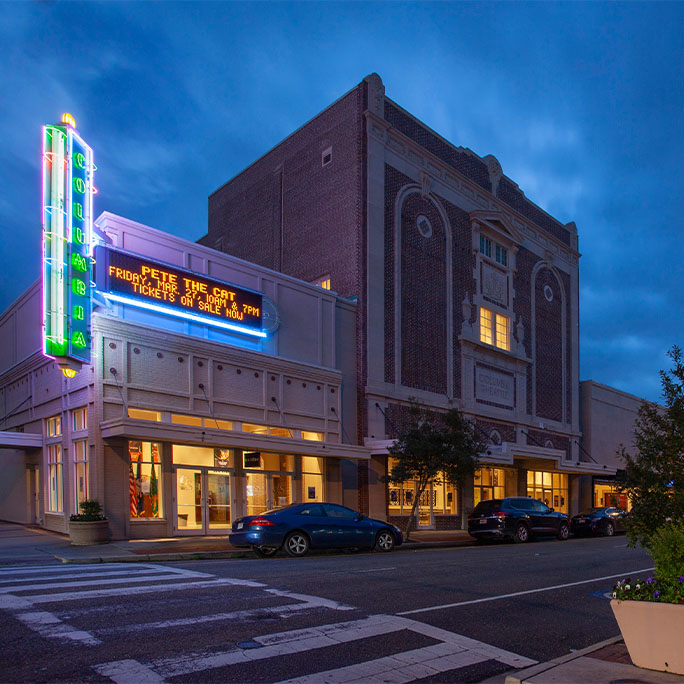 Outside of Columbia Theatre at night.