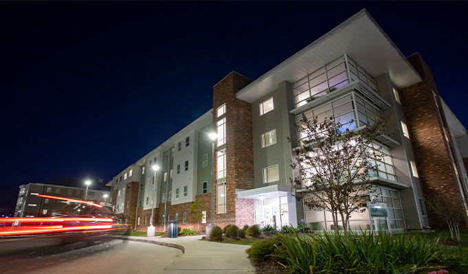 Outside Ascension Hall dorms at night.