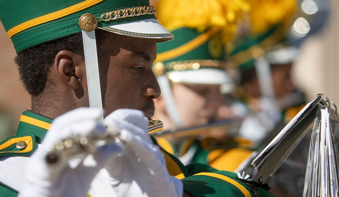 Band members performing a song.