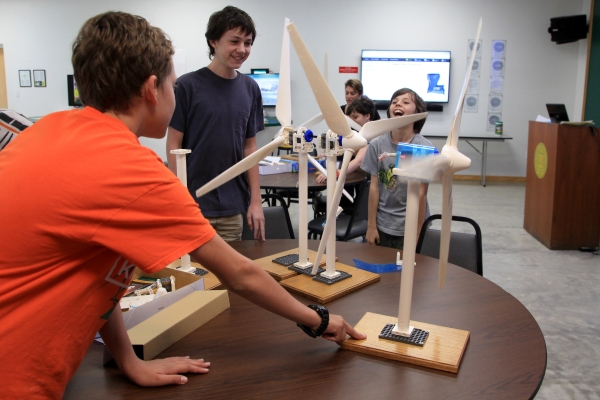 students with miniature wind powered turbines