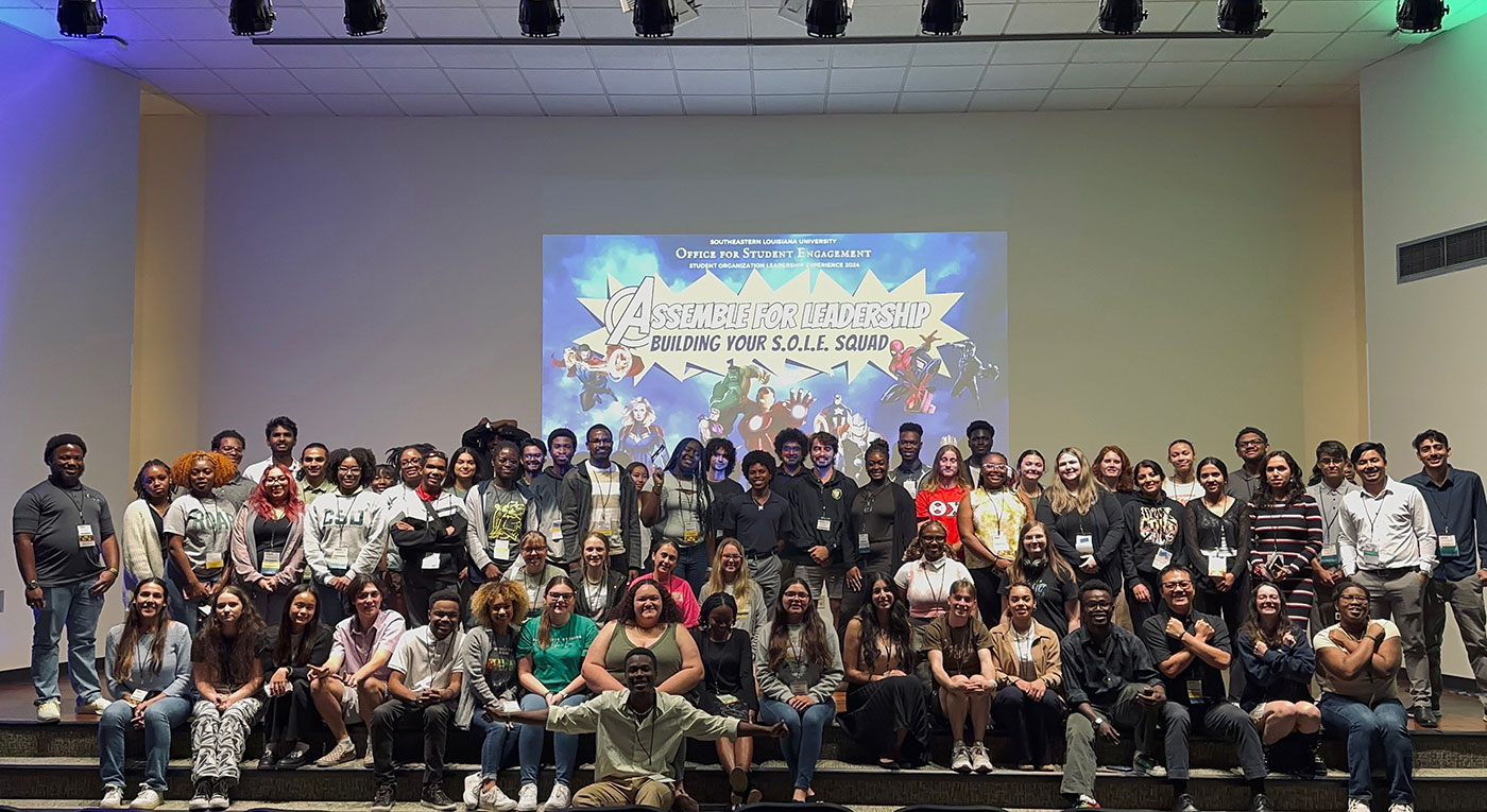 Students posing for a picture at the 2024 SOLE Conference for Office of Student Engagement.